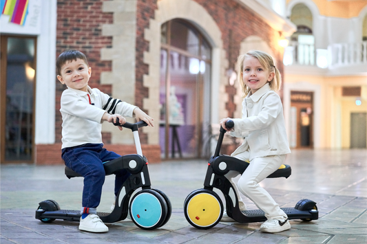 Little boy and a little girl riding multifunctional 5 in 1 Scooter